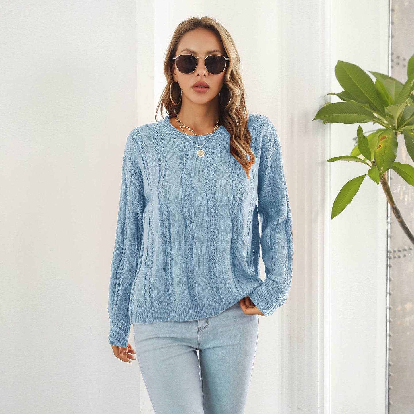 Le Pull Tricoté à Manches Longues