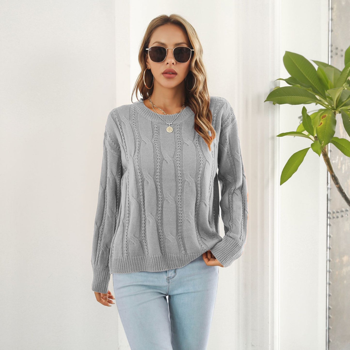 Le Pull Tricoté à Manches Longues